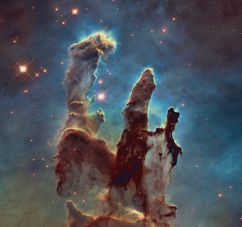 Animation of the new Hubble Space Telescope visible light and near-infrared views of the Pillars of Creation (click for larger version)